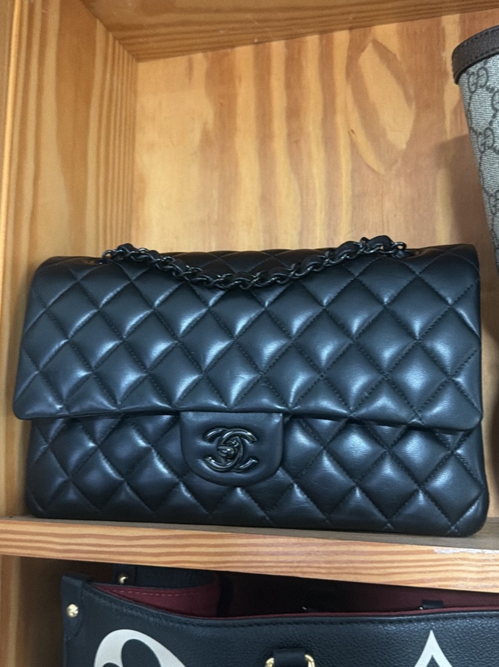 CHANEL Black Quilted Leather Shoulder Bag with Chain Strap